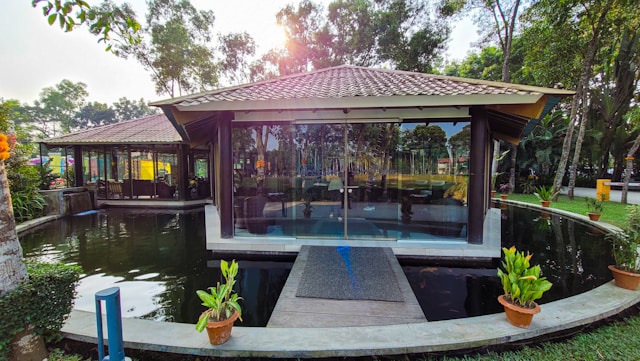a-swimming-pool-with-a-covered-patio